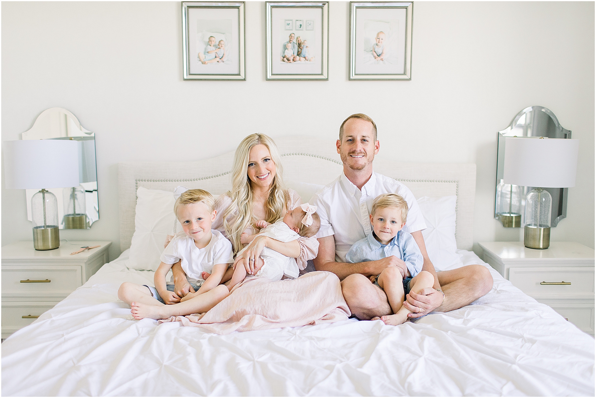 Family on bed for a lifestyle photography session in Oklahoma.
