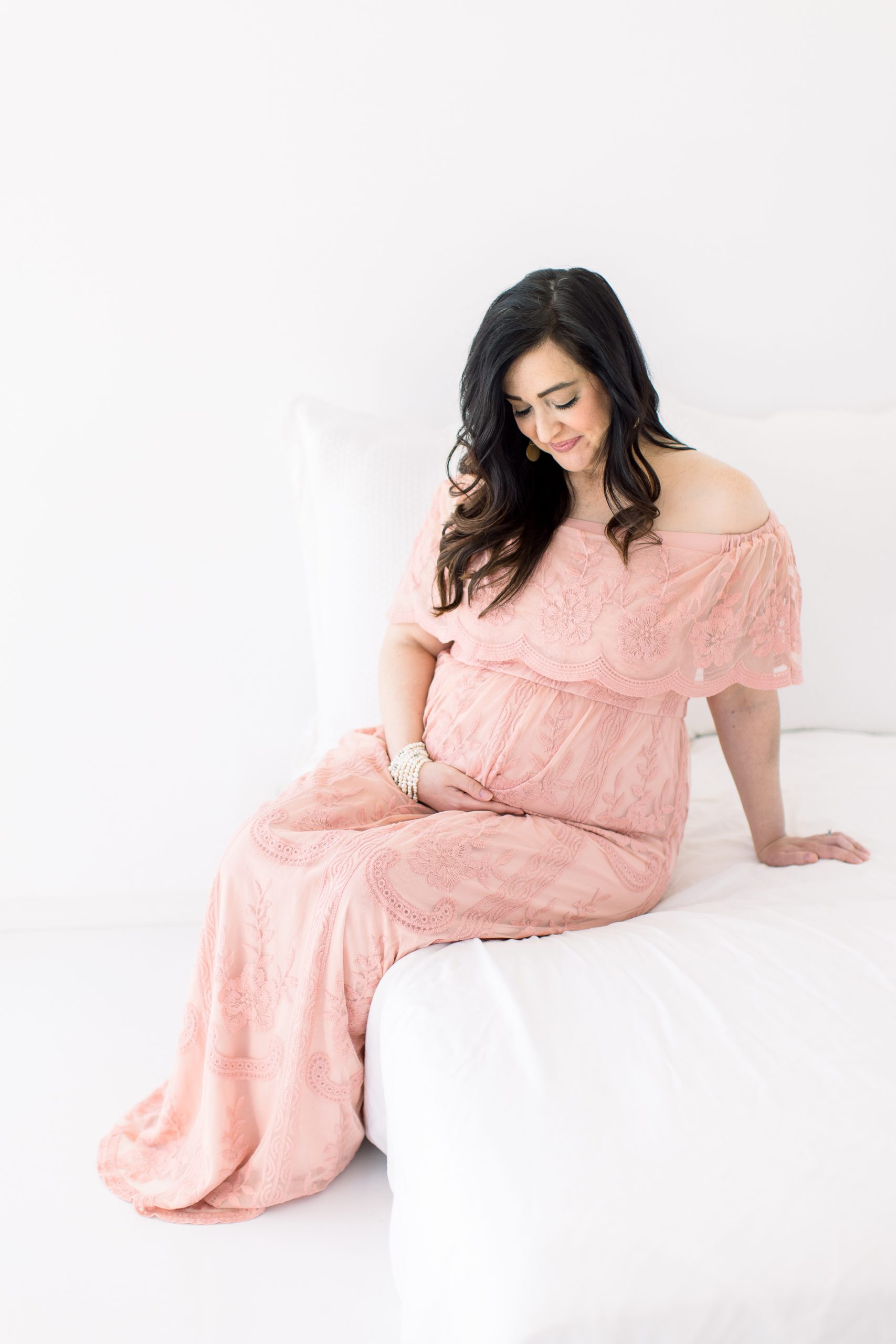 Stunning expecting mama in a pink maternity dress in OKC.