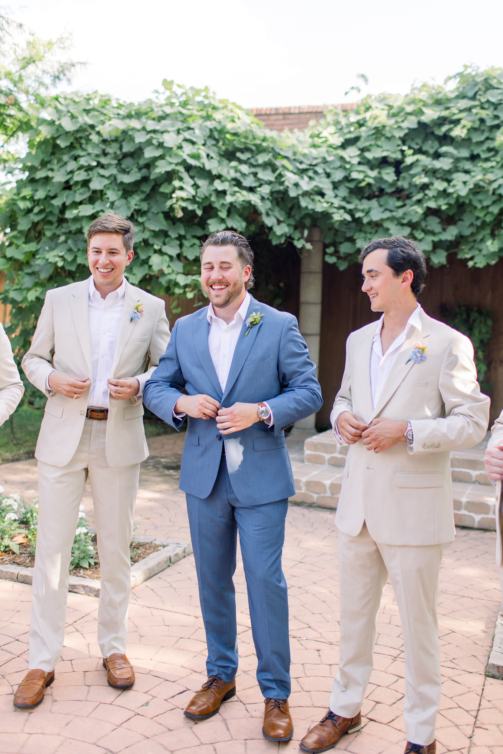 Oklahoma wedding photography outdoors grooms with suits on