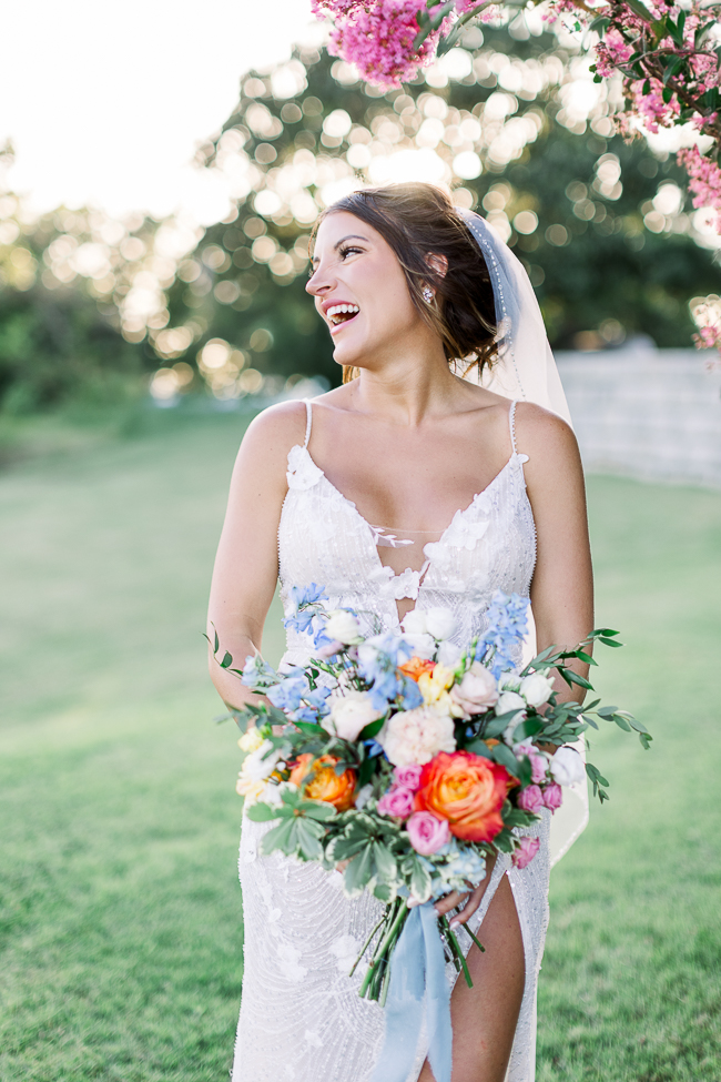 bride laughing at wedding