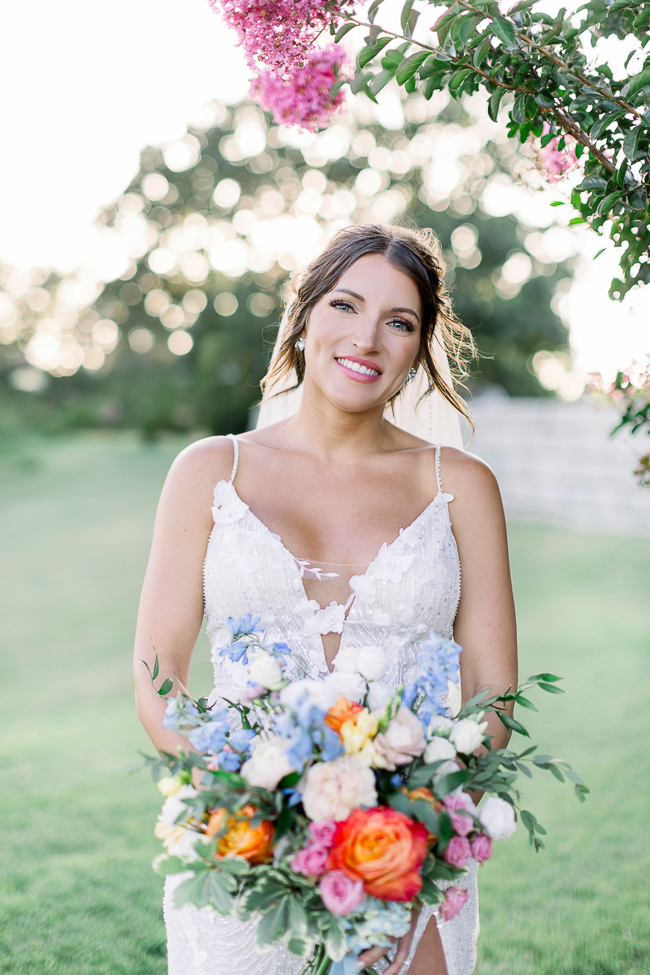 bride holding flowers