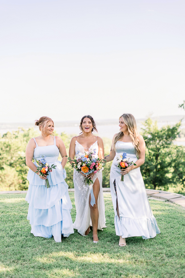bridesmaids and bride walking at wedding
